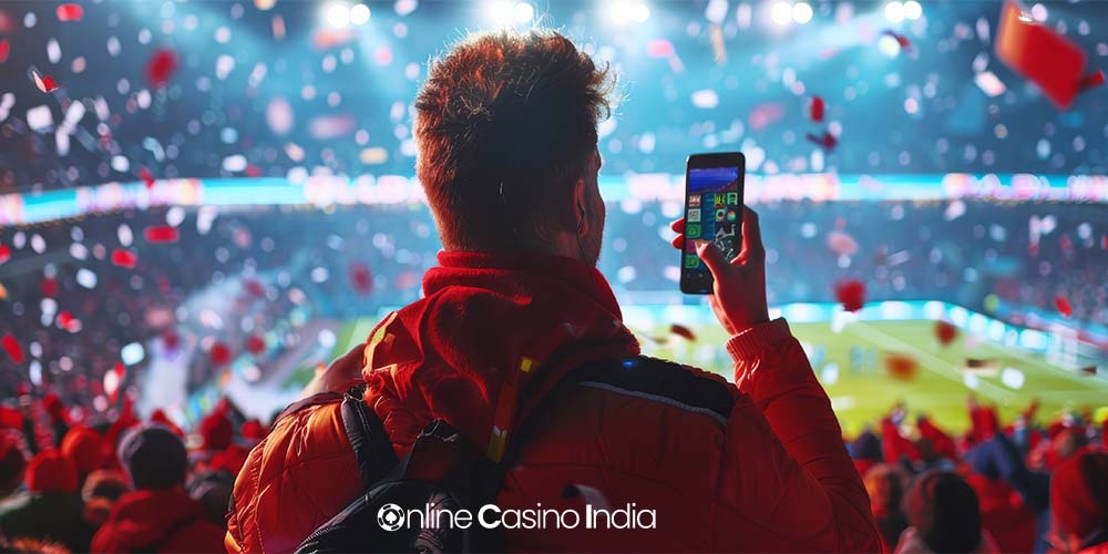 man betting on online cricket from stadium